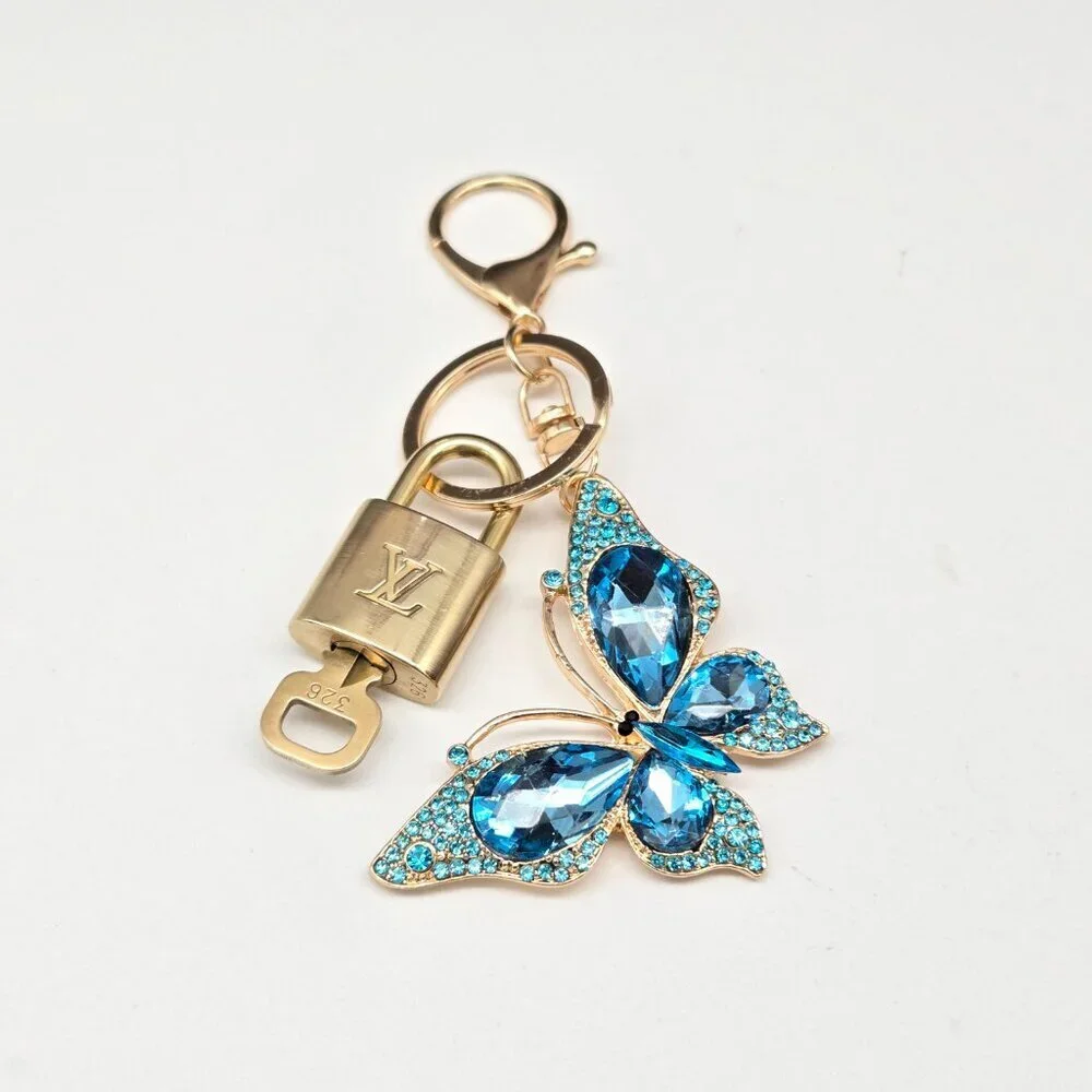 LV Authentic Gold Lock & Key 🔑 Luxury Bag Charm w/ Unbranded Butterfly Keychain